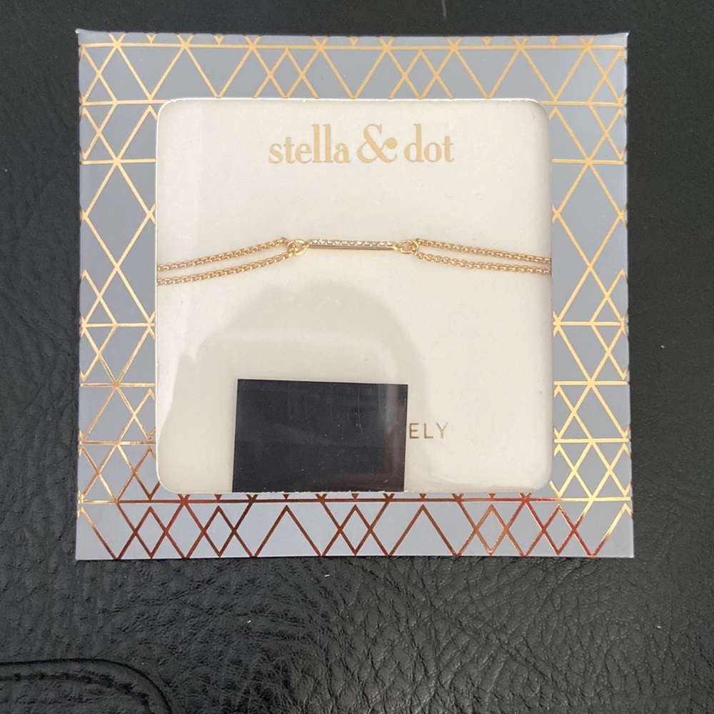 Gold bracket with rhinestones